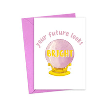Load image into Gallery viewer, A greeting card with a purple envelope. The Future Looks Bright Funny Graduation Card or Congratulations Card from R is for Robo showcases a pink crystal ball on a yellow stand, encircled by the playful words "your future looks BRIGHT" in pink and yellow letters—ideal for celebrating new beginnings with humor and style.