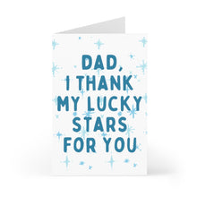 Load image into Gallery viewer, Celebrate Father's Day with the "Thank my Lucky Stars for You" sentimental card from R is for Robo. This cute card features the heartfelt message "Dad, I thank my lucky stars for you" in bold blue letters against a background of delicate blue stars, providing the perfect space to add your personal handwritten note.
