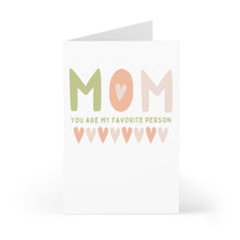 Load image into Gallery viewer, Experience the heartfelt charm of the "Mom You are My Favorite Cute Mother's Day Card from Daughter" by R is for Robo. This beautifully designed card showcases the word MOM in bold letters, with a heart nestled inside the O. Beneath it, green text expresses "You are my favorite person," while a sequence of peach and beige hearts graces the bottom, evoking the warmth of a handwritten note.