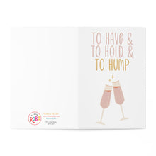 Load image into Gallery viewer, A cheeky wedding card from R is for Robo, titled "Have and To Hold and To Hump Inappropriate Dirty Wedding Card," features two champagne glasses clinking with the playful text "TO HAVE & TO HOLD & TO HUMP." The card includes the R is for Robo logo and social media details in the bottom left corner, adding a humorous touch to any celebration.