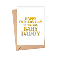 Load image into Gallery viewer, The "Baby Daddy Funny Fathers Day Card" by R is for Robo comes with a brown envelope and displays the message "Happy Fathers Day to the best Baby Daddy" in bold, golden letters. You can personalize it further with an optional hand-written note inside.