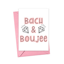 Load image into Gallery viewer, The Bach and Boujee Bachelorette Party Card by R is for Robo showcases pink and black lettering with the phrase "Bach & Boujee" alongside diamond ring illustrations. It's perfect for infusing your handwritten note with a glamorous touch, elegantly presented on a pink envelope.