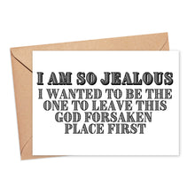 Load image into Gallery viewer, The So Jealous Funny Going Away Card by R is for Robo includes a brown envelope and showcases bold text: I am so jealous I wanted to be the one to leave this godforsaken place first. It captures the bittersweet farewell sentiment with its beautifully crafted, heavyweight matte design, resembling a hand-written note.