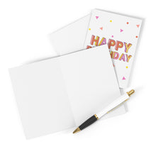 Load image into Gallery viewer, A blank heavyweight matte card and a white pen with gold accents are placed on a flat surface. Behind them, you can see the vibrant 90s Retro Birthday Card for Him or Her by R is for Robo, featuring the words "Happy Birthday" and multicolored confetti designs—an ideal choice for adding a heartfelt handwritten note.