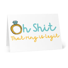 Load image into Gallery viewer, The "That Ring is Legit Funny Engagement Card for Bride" by R is for Robo is a delightful choice, featuring an illustrated diamond ring design along with the cheeky phrase "Oh Shit, That ring is legit" in bold teal and yellow letters—ideal for celebrating the bride-to-be.