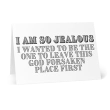 Load image into Gallery viewer, The So Jealous Funny Going Away Card by R is for Robo is made from heavyweight matte material. When opened, it reveals the bold message: "I am so jealous. I wanted to be the one to leave this god forsaken place first." The striking black font on a crisp white background delivers a heartfelt farewell.