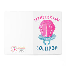 Load image into Gallery viewer, This humorous Valentine's Day card, called "Lick that Lollipop Funny Dirty Valentines Day Card" from R is for Robo, features a pink, diamond-shaped lollipop with a blue stick. The playful text says, "Let me lick that happy Valentine's Day lollipop." The ROBO logo and copyright details are located neatly in the bottom left corner. Ideal for including a cheeky handwritten personal message!