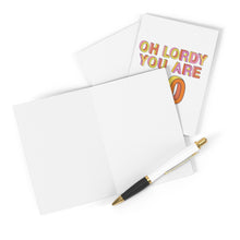 Load image into Gallery viewer, A blank greeting card and a pen are displayed alongside an unfolded 40th Birthday Card from R is for Robo, featuring colorful text that reads, "Oh Lordy You Are 40." The cards are humorously arranged on a white surface, making it perfect for celebrating with a Funny Milestone Birthday Card for Him or Her.
