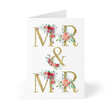 Load image into Gallery viewer, The Mr and Mr Wedding Card by R is for Robo showcases the words "MR & MR" in sophisticated gold lettering, with each "R" beautifully accented by red and pink floral designs. Ideal for a Mr and Mr wedding, this card stands elegantly on its own against a subtle background, ready to hold your personalized handwritten message inside.