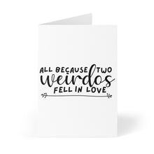 Load image into Gallery viewer, The "Two Weirdos Funny Wedding Card" by R is for Robo features a white card with the phrase "All because two weirdos fell in love" written in a black cursive-style font, complemented by an arrow highlighting the word "weirdos." This card makes an ideal wedding greeting and comes beautifully paired with a rustic kraft envelope for an authentic touch.