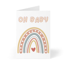 Load image into Gallery viewer, Introducing the "Oh Baby Boho Rainbow New Baby Card" by R is for Robo. This charming card features the phrase "Oh Baby" at the top, with a gently arching pastel-colored boho rainbow decorated with dots and hearts. At the center of this delightful design is a large heart, creating a simple yet cheerful space perfect for your heartfelt hand-written note.