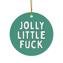 Load image into Gallery viewer, Adding a touch of sassy holiday decor, the Jolly Little Fuck Funny Christmas Ornament by R is for Robo is a round green piece with bold white text. It&#39;s perfect for those who appreciate cheekiness in their festive celebrations, hanging elegantly by a thin yellow string.
