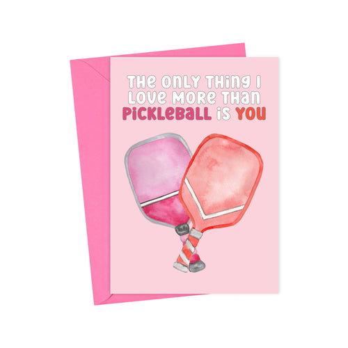 R is for Robo presents a Pickleball Valentines Day or Anniversary Card featuring watercolor paddles and the text The only thing I love more than pickleball is you, with you in bold pink. Its perfect for pickleball lovers and comes with a charming pink envelope.