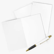 Load image into Gallery viewer, Displayed on a gray surface is a collection of blank white sheets, including the Pickleball Birthday Card from R is for Robo—a humorous birthday card perfect for pickleball enthusiasts. Diagonally across the paper lies a white and black ballpoint pen with gold accents.
