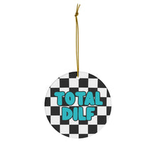 Load image into Gallery viewer, The DILF Christmas Ornament by R is for Robo, featuring a humorous round design with a black and white checkerboard pattern and bold light blue &quot;TOTAL DILF&quot; text, is perfect as holiday decor. Its gold string makes it an ideal gift for a hot dad.
