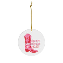 Load image into Gallery viewer, The Pink Cowboy Boot Christmas Ornament for Women by R is for Robo is a white circular decoration featuring a pink cowboy boot illustration and the festive text &quot;Merry Christmas y&#39;all&quot; in red and pink, all hung on your tree with a gold string.
